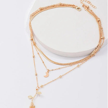 Sophisticated Golden Rose Pendant Necklace Set
