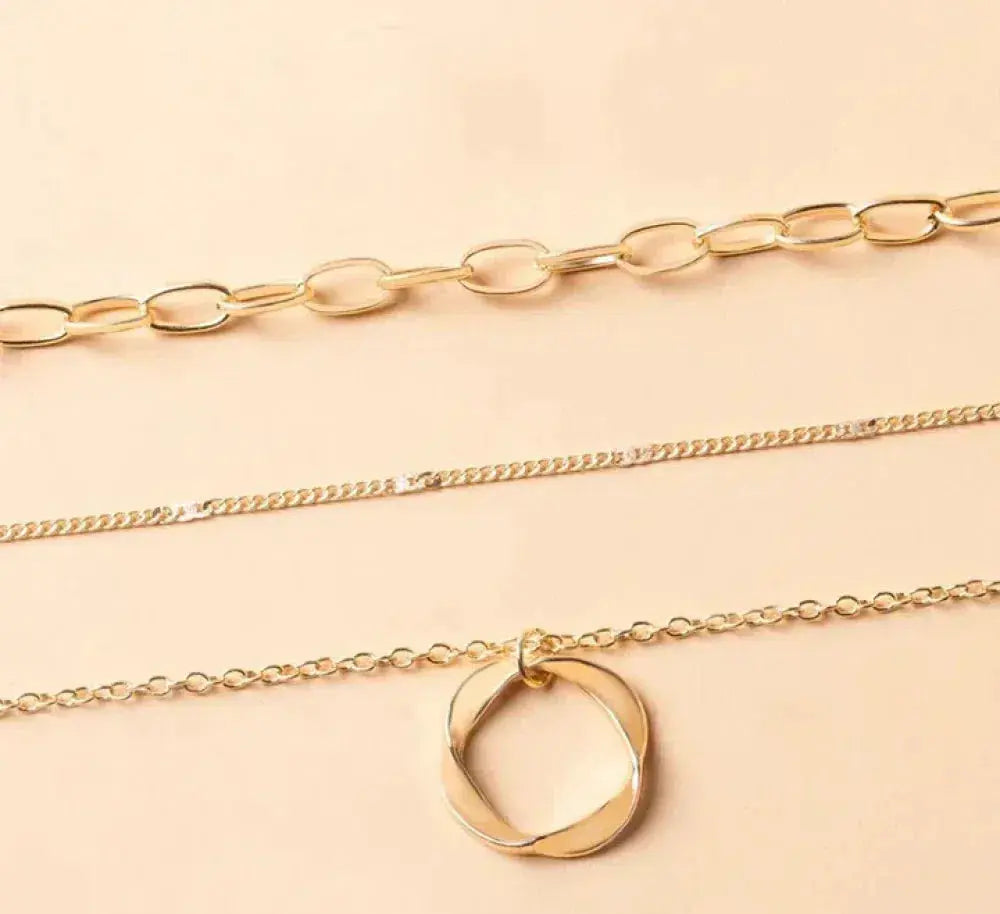 Classic Gold Layered Necklace with Pendant Design